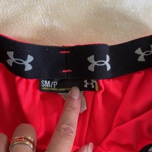 Under Armour hot pink running shorts